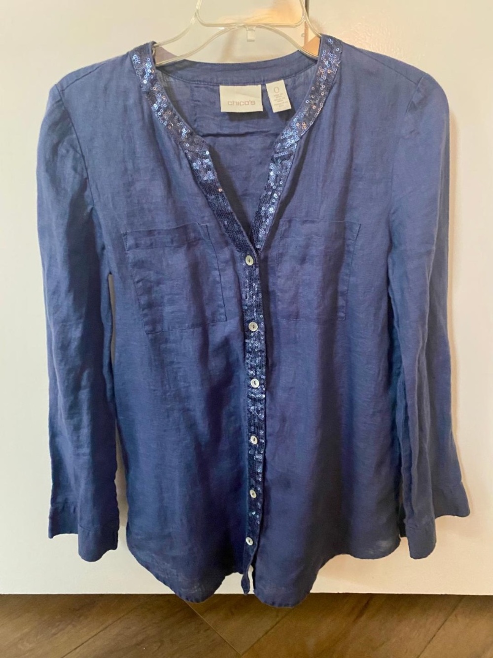 Chico's blue linen blouse with sequin trim and lace detail on back, size 0
